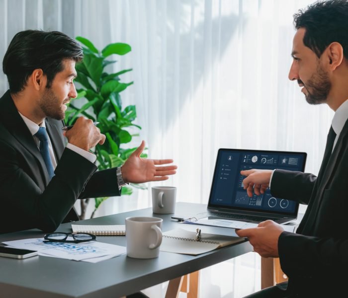 two-men-are-discussing-project-that-has-time-9-30
